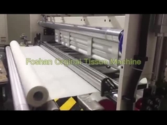 Kitchen towel rewinding machine
